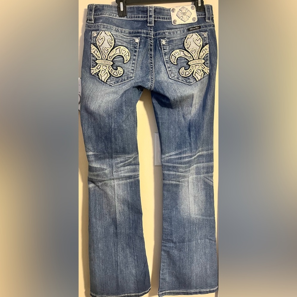 Miss Me Blue Boot Cut Vintage Jeans with beautiful Fleur de lis design.